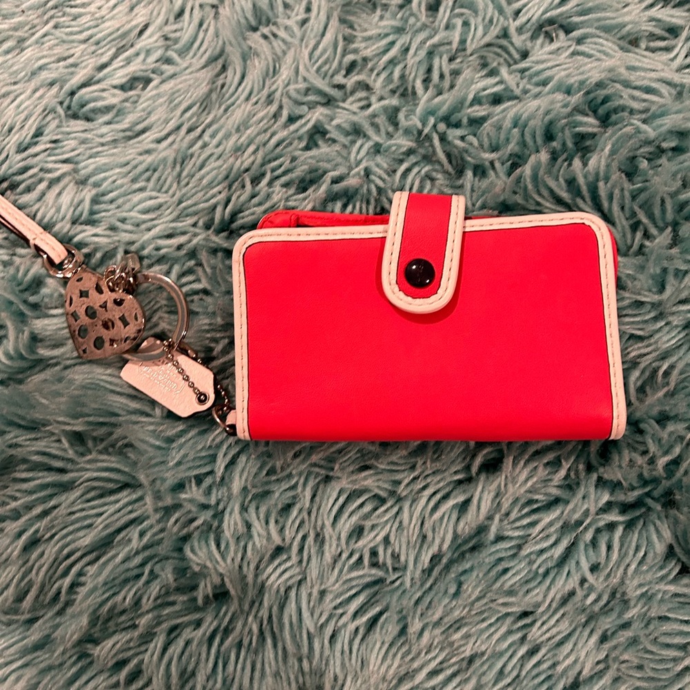 Pink coach wallet with charm